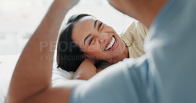 Buy stock photo Happy couple, laughing and morning with bed in relax for bonding, love or support together at home. Young man and woman with smile and enjoying weekend, holiday or funny humor in bedroom at house