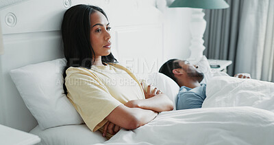 Buy stock photo Upset, sleeping and couple in bed at house with divorce for infidelity, cheating or affair. Angry, rest and woman with insomnia for argument with boyfriend for toxic relationship in bedroom at home.