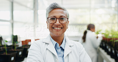 Buy stock photo Woman, scientist and smile in greenhouse for portrait for conservation, pride and research for agriculture. Mature person, laboratory and chemistry for study, growth and sustainability in Indonesia