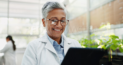 Buy stock photo Woman, smile and science with tablet in greenhouse for climate change, research and ecology. Scientist, innovation and mature person with tech by plants for ecosystem, development and biochemistry