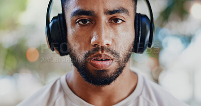 Buy stock photo Portrait, headphones and man with fitness, tired and fatigue with sound, listening to music and sweaty. Face, runner or athlete with headset, exhausted or song for motivation, exercise goals or audio