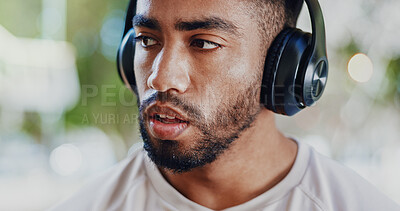Buy stock photo Thinking, headphones and man with fitness, tired and fatigue with sound, listening to music and relax. Person, runner or athlete with headset, exhausted or song for motivation, exercise goals or calm