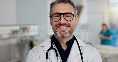 Buy stock photo Mature doctor, man and smile in portrait, hospital and pride for career, wellness and healthcare. Person, happy and glasses in clinic for medical services with confidence, coat and healing in France