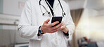 Hands, doctor and man with smartphone, typing and healthcare with online schedule, internet and wellness. Closeup, medical and professional with cellphone, research for treatment and digital app