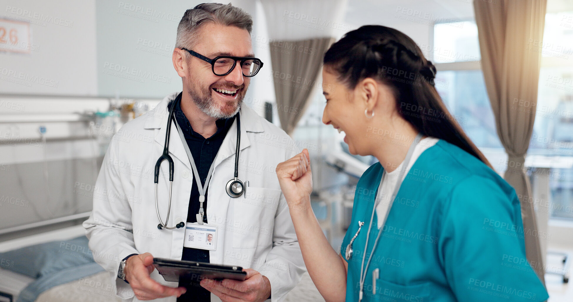 Buy stock photo Celebration, doctor and nurse in hospital room, smile and happy with results of diagnosis and teamwork. Tablet, people and collaboration for research, success and thank you for help in healthcare