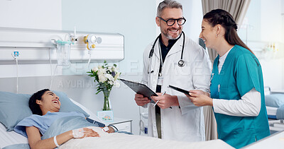 Buy stock photo Patient, doctors, and tablet in hospital, teamwork and help with joke, laughing and connection. Clinic, nurse or medical with professional, tech or internet with humor, healthcare or treatment result