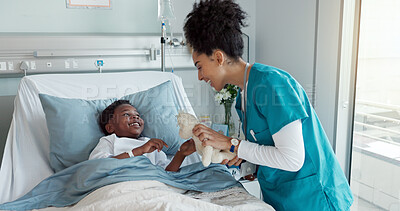 Buy stock photo Pediatrician, kid and patient with smile for doll at hospital for checkup, good news and recovery. People, happy and satisfied with progress on illness or disease with care, support and love in bed