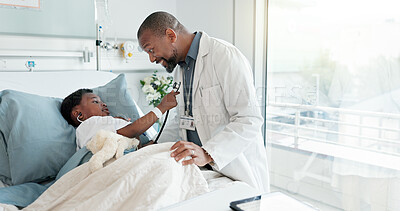 Buy stock photo Doctor, child and playing with stethoscope in hospital for breathing check, pretend and imagination in bed. Black people, cardiology or lungs test in healthcare with recovery, support or pediatrician