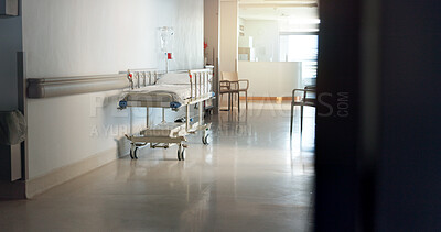 Buy stock photo Hospital, room and interior with bed in lobby for inpatient care, recovery and health insurance. Clinic, gurney and empty space with furniture for emergency, medical service and rehabilitation