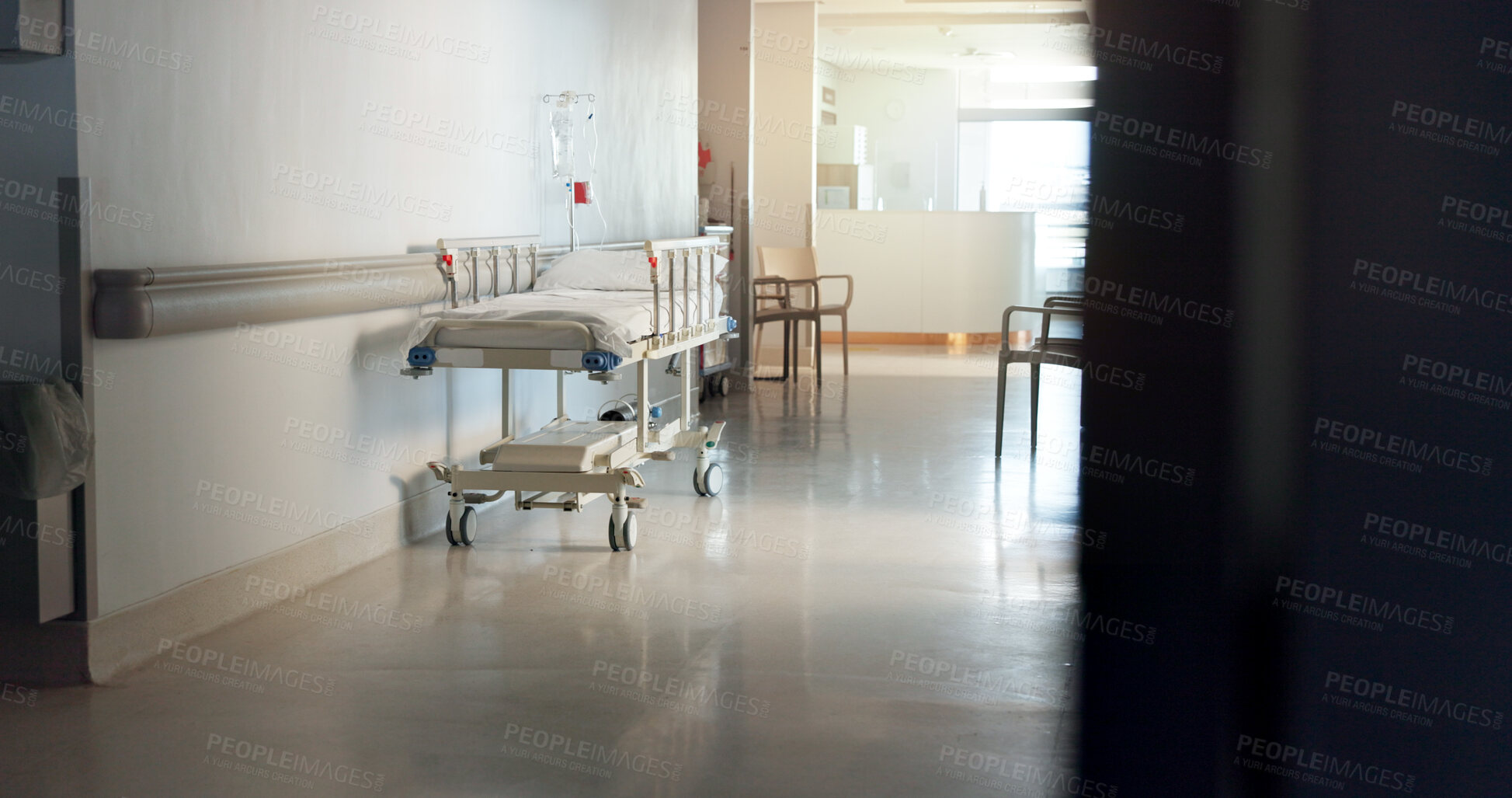 Buy stock photo Hospital, room and interior with bed in lobby for inpatient care, recovery and health insurance. Clinic, gurney and empty space with furniture for emergency, medical service and rehabilitation