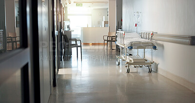 Buy stock photo Empty, hospital and interior with bed in lobby for inpatient care, recovery and health insurance. Clinic, gurney and space in room with furniture for emergency, medical service and rehabilitation