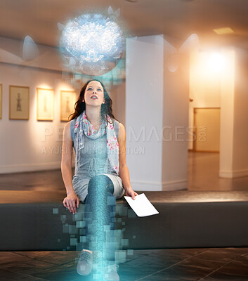 Buy stock photo Shot of a young woman looking at paintings in a gallery