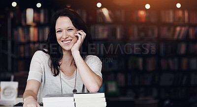 Buy stock photo Portrait of a young woman leaning on stacks of books in a bookstore