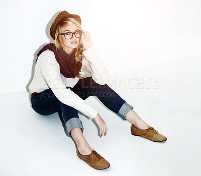 Buy stock photo Fashion, glasses and young woman in a studio with a trendy, cool and stylish outfit and accessories. Confident, portrait and female model from Australia with edgy and casual style by white background