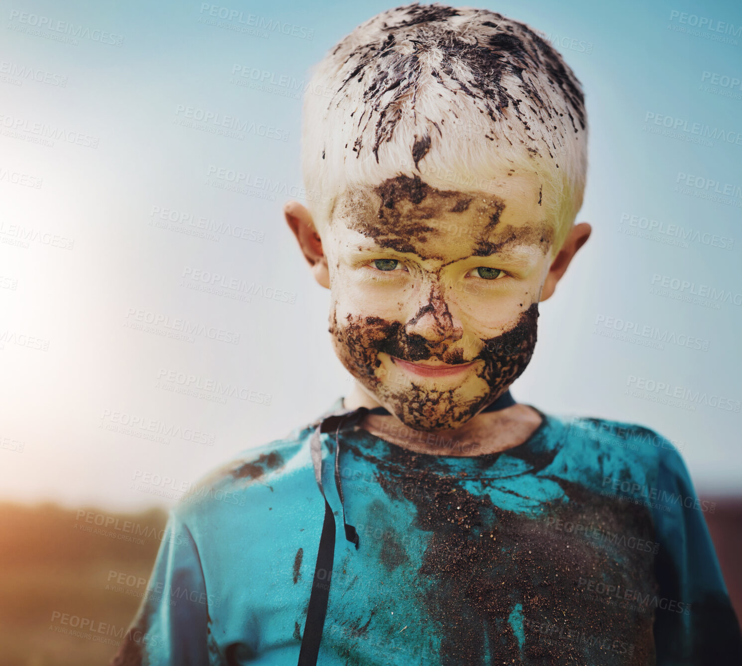 Buy stock photo Boy, child and mud on face with smile from playing, dirt or happiness in summer weather or water. Kid, person and portrait with satisfaction for messy or dirty fun outdoor in sunshine or garden