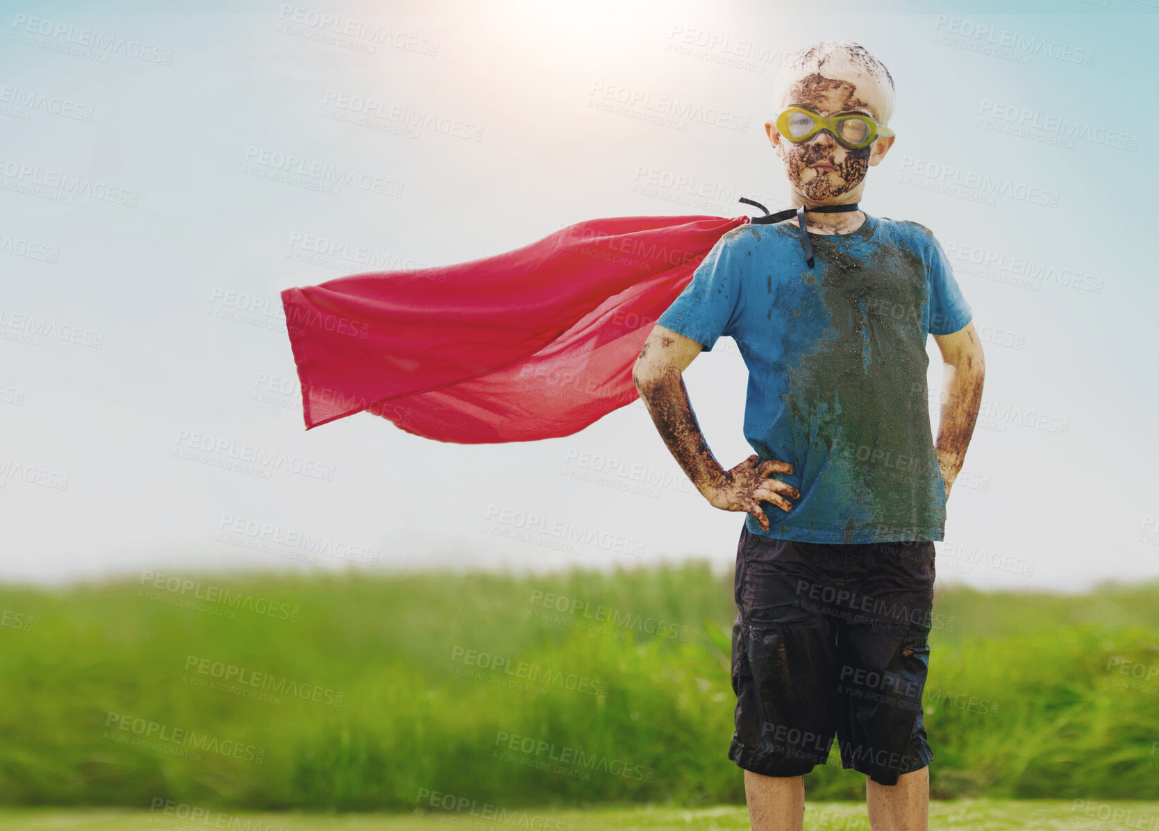 Buy stock photo Portrait, child and superhero cape for fun, cosplay and confidence in outdoor playground or park. Little boy, pride and costume as messy, muddy and dirty in garden for games, development or adventure