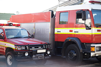 Buy stock photo Fire engine, truck and rescue services at station ready for firefighting, emergency and transportation. Firefighter vehicles parked outside for safety, transport and equipment  for brigade protection