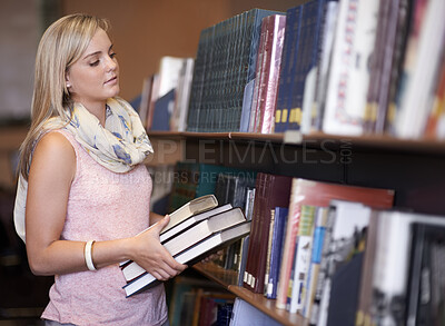 Buy stock photo Woman, books and library on shelf for literature, learning knowledge or packing at bookstore. Young person or student for information on story, textbook or research for study, bookshelf or reading