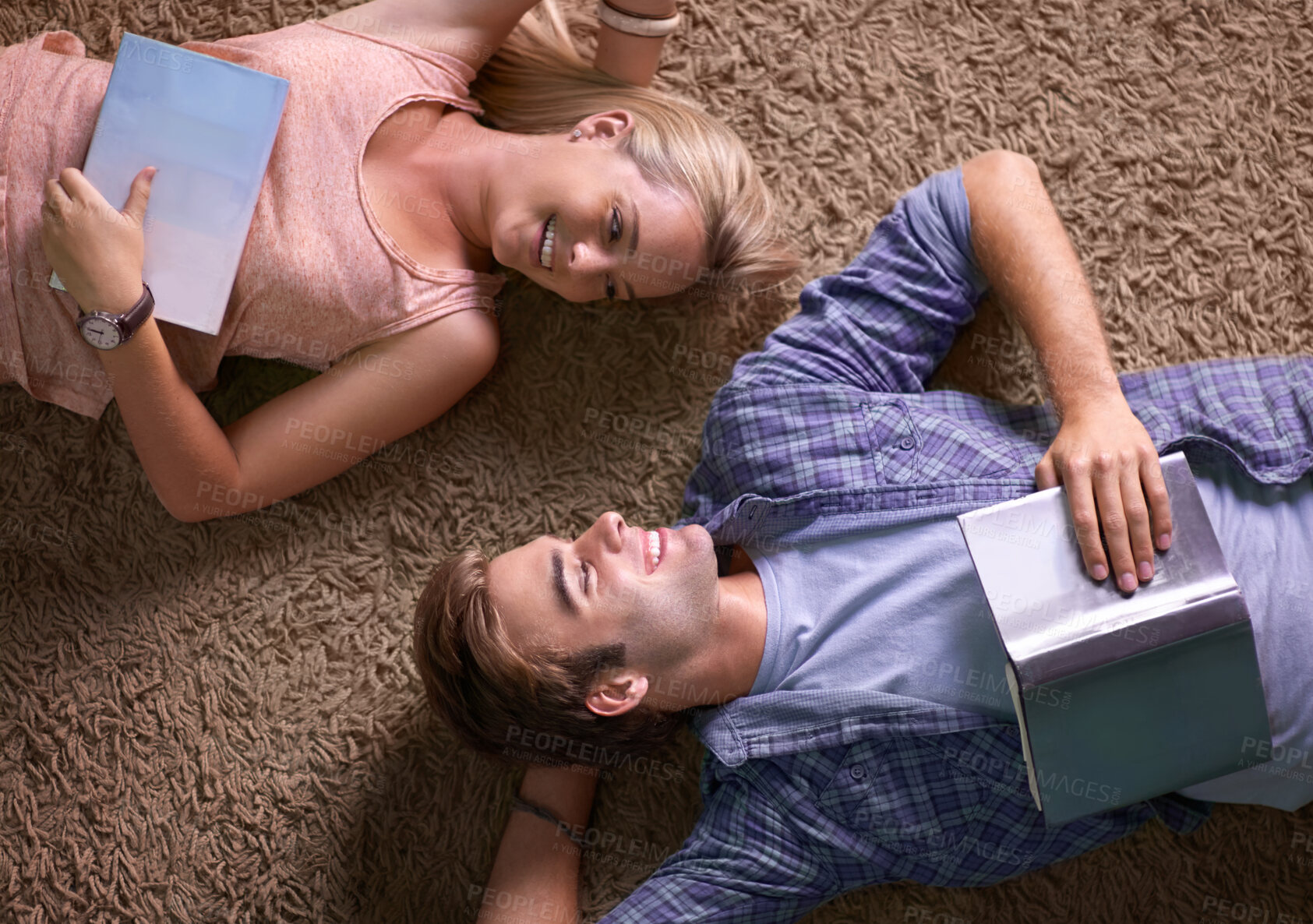 Buy stock photo Above students, books and floor for studying, scholarship or happy for development at university. People, education and textbook with smile for knowledge, information or research at college campus