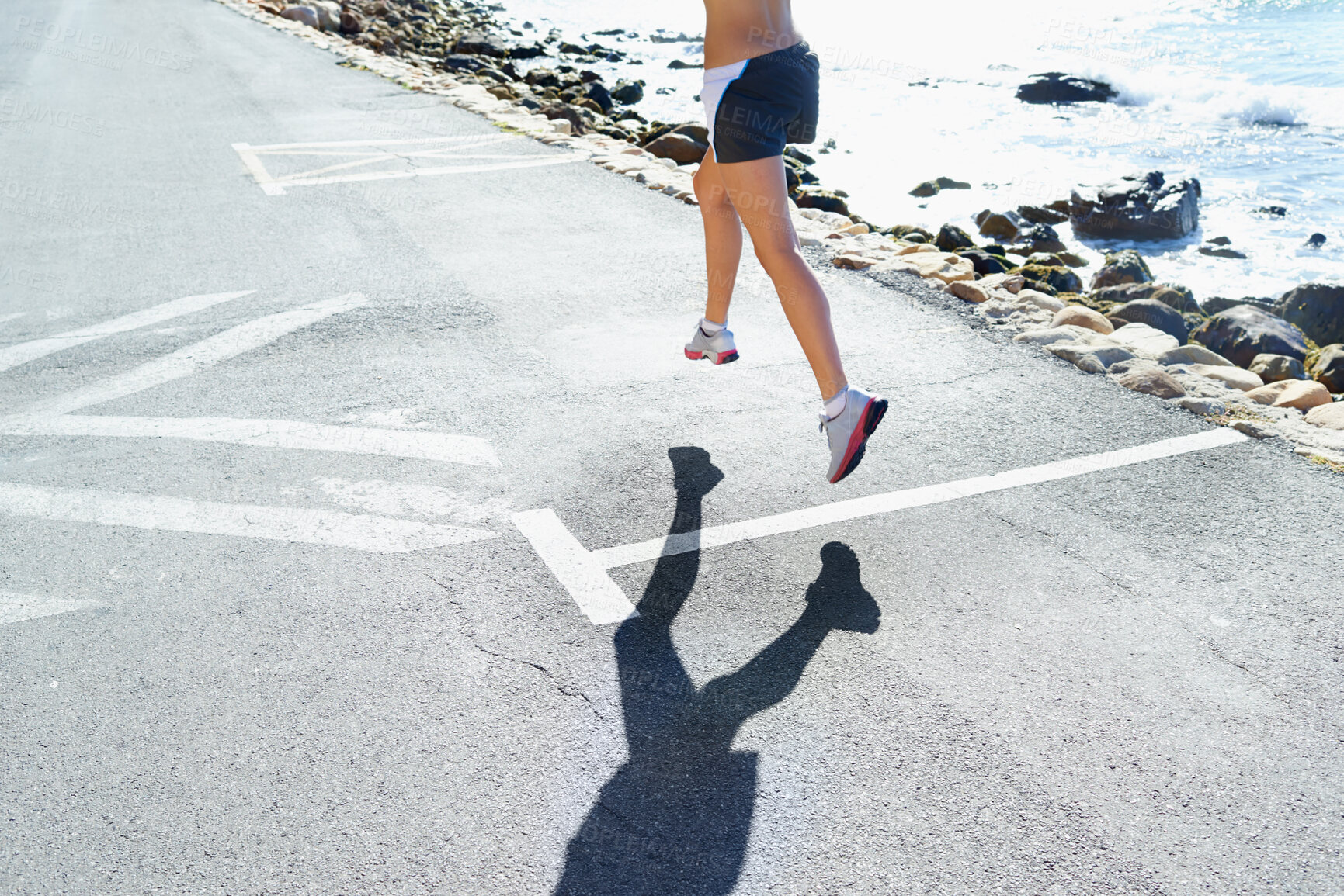 Buy stock photo Person, fitness and running in city, workout and morning for exercise, health and strong. Training, cardio and legs for athlete, town or sports strength, for race, active and marathon runner
