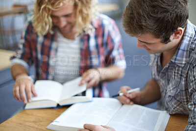 Buy stock photo Men, students and reading from textbook in university classroom for group work, education or research. Male people, friends and college lecture for test information or together, knowledge or learning