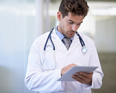 Buy stock photo Cropped shot of a handsome young doctor