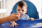 One more bite my boy! Open wide!