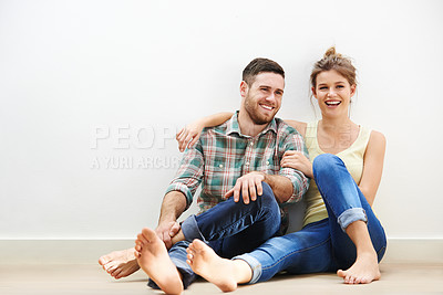 Buy stock photo Couple, smile and relax in house for bonding, conversation and love together with romance on floor. Man, woman and embrace on apartment ground for talking, relationship and chill on weekend with hug