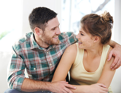 Buy stock photo Happy couple, partner and hug for support, love and relationship with bonding together in home. Woman, man and cheerful for comfort, romance and relax in living room for embrace, holding and memory