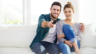 Buy stock photo Relax, portrait and happy couple watching tv in home for movie choice, streaming service and chill. Television, man and woman smile in living room for drama show, film and change channel on couch