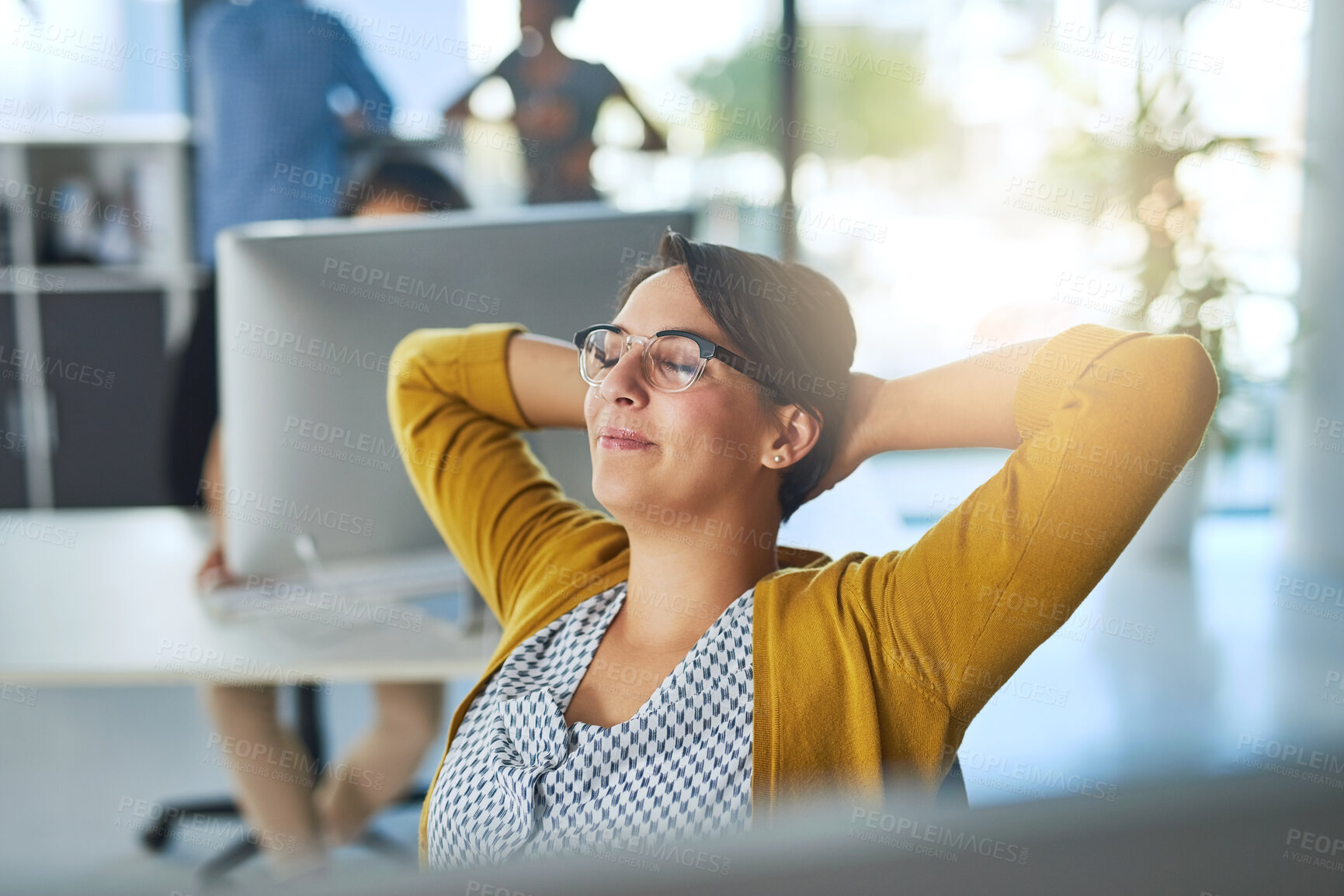 Buy stock photo Business woman, stretching and finished to relax or break at desk in digital agency or company. Female person, employee and smile in office, corporate job or career as project management professional