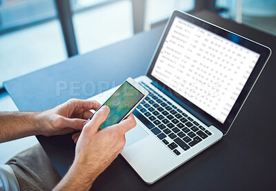 Buy stock photo Person, hands and phone by laptop for communication, social media or website at office desk. Creative hands, screen and computer for freelance, mobile app design or UX test for startup technology