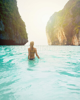 Buy stock photo Back, woman and swimming at beach for Thailand vacation, horizon and blue ocean water in summer. Tourist, sea and freedom for travel, tropical adventure and relaxing at coastal island destination