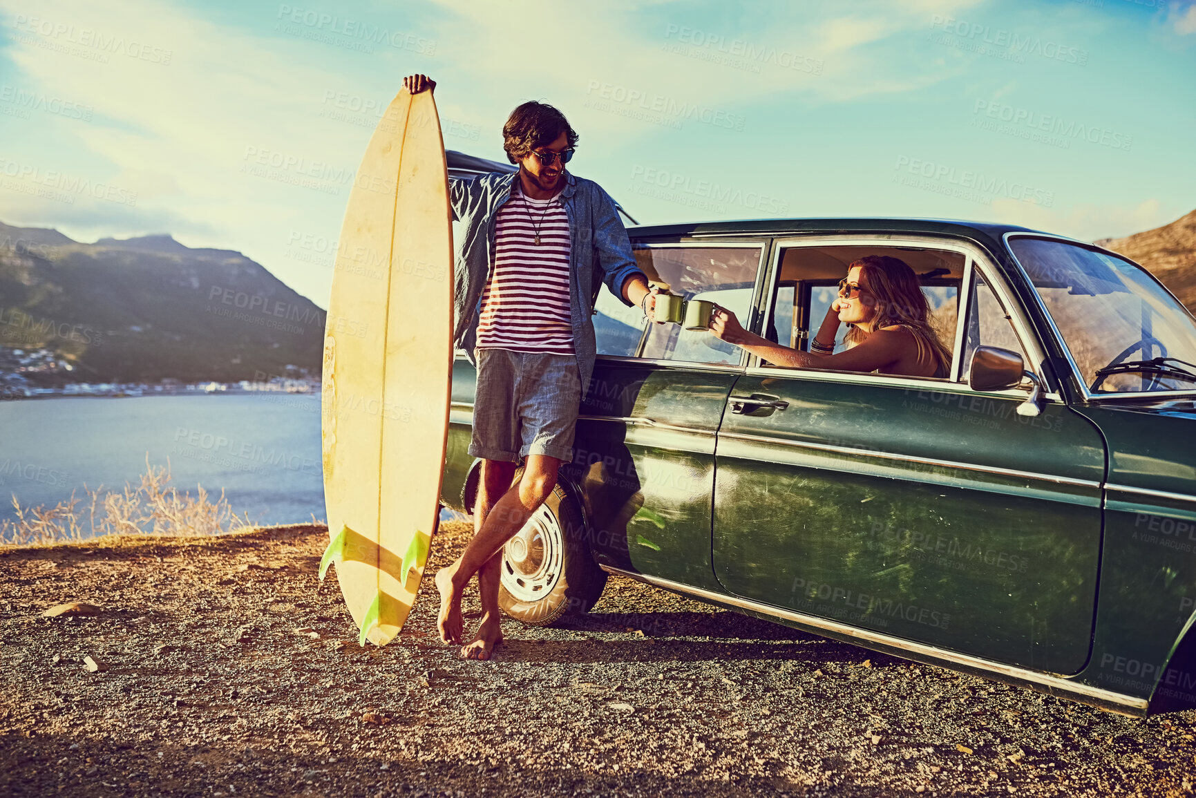 Buy stock photo Couple, coffee and cheers for surfing by beach, travel and road trip to ocean for adventure. People, relax and vehicle for journey to nature, holiday and board for sea getaway or toasting to love