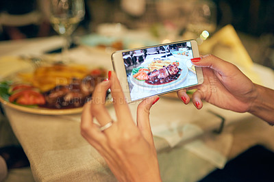 Buy stock photo Hand, woman and smartphone screen for food photography on dinner in table at restaurant for social media post. Influencer, female person and picture with wine on date for relationship, break and vlog