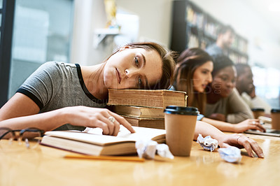 Buy stock photo Education, tired and woman with books in library, thinking and exhausted in university, stress or learning. Scholarship, student and contemplating for knowledge, pile and burnout of person in college