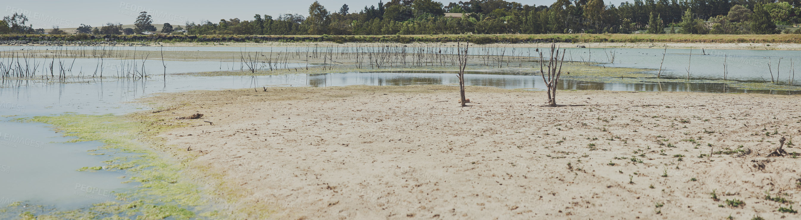 Buy stock photo Environment, empty dam and water with drought, natural disaster or climate change crisis in summer. Landscape, countryside and outdoor by lake for eco emergency, global warming or banner in Portugal