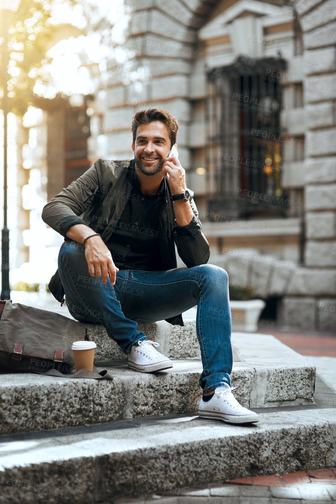 Buy stock photo Phone call, relaxing and man in city for communication, talking and travel on street with outdoor pedestrian. Smile, explore and creative guy with coffee, downtown and urban New York work trip