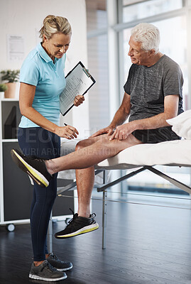 Buy stock photo Physical therapy, senior patient and knee injury with medical consultation, exam and assessment of muscle progress. Chiropractic, doctor or people with documents, checklist and leg recovery in physio