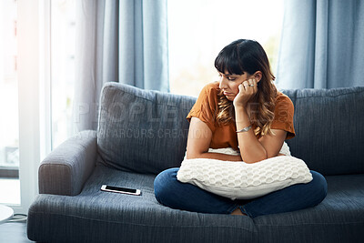 Buy stock photo Breakup, depression or sad woman waiting for call for relationship stress or anxiety on couch. Impatient, lonely and upset girl disappointed by toxic cyberbullying message on phone or mobile in home