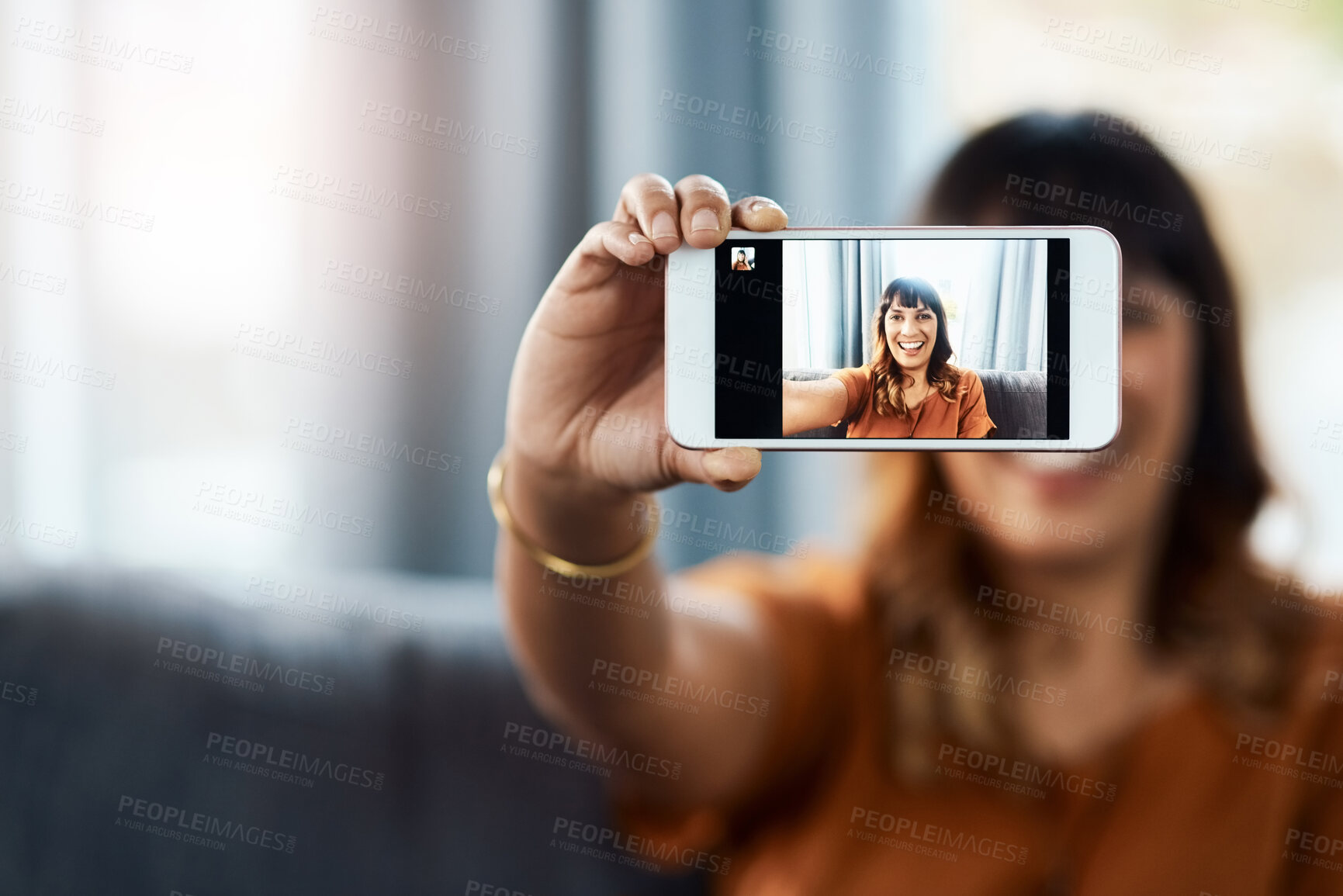 Buy stock photo Woman, selfie and phone screen for portrait on couch in home for memory, happy or photography in living room. Person, influencer and smile for live streaming, vlog or profile picture for social media