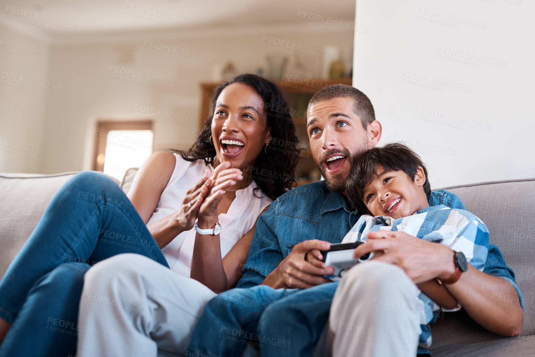 Buy stock photo Games, TV and parents with child on sofa in home for bonding, relax and playing online in living room. Gaming, family and happy mom, dad and kid on couch streaming cartoons, entertainment and series