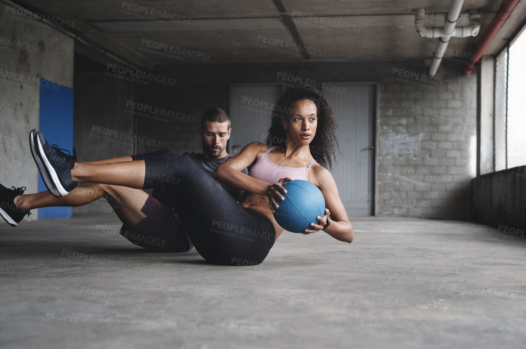 Buy stock photo Couple, exercise and fitness with medicine ball outdoor for workout, balance training and core strength of performance. Active, people and muscle challenge, strong biceps and support for gym results