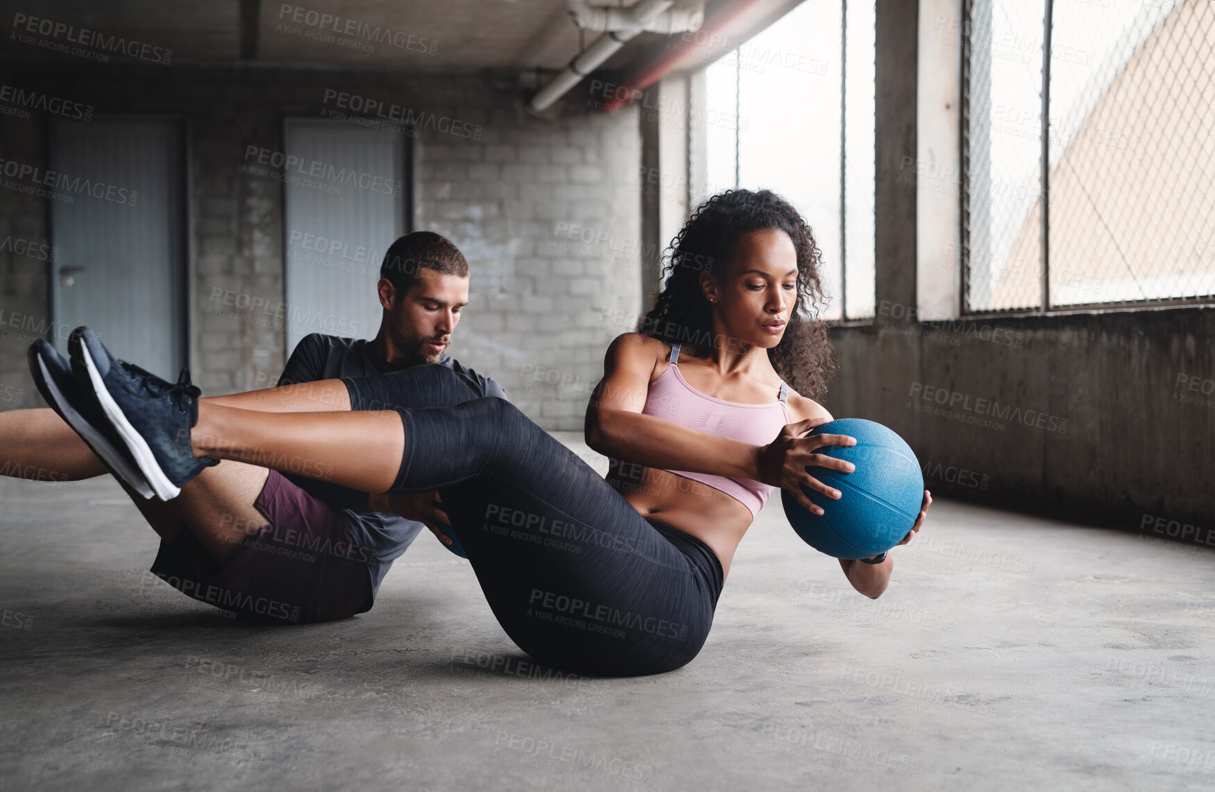 Buy stock photo Exercise, couple and fitness with medicine ball outdoor for workout, balance training and core strength of performance. Active, people and muscle challenge, strong biceps and support for gym results