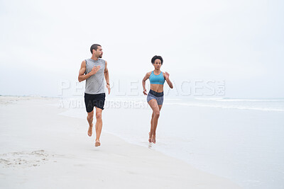 Buy stock photo Beach, running and couple with fitness, exercise and training with support, time together and ocean. Healthy people, outdoor and seaside with man, woman and wellness with hobby, routine and cardio