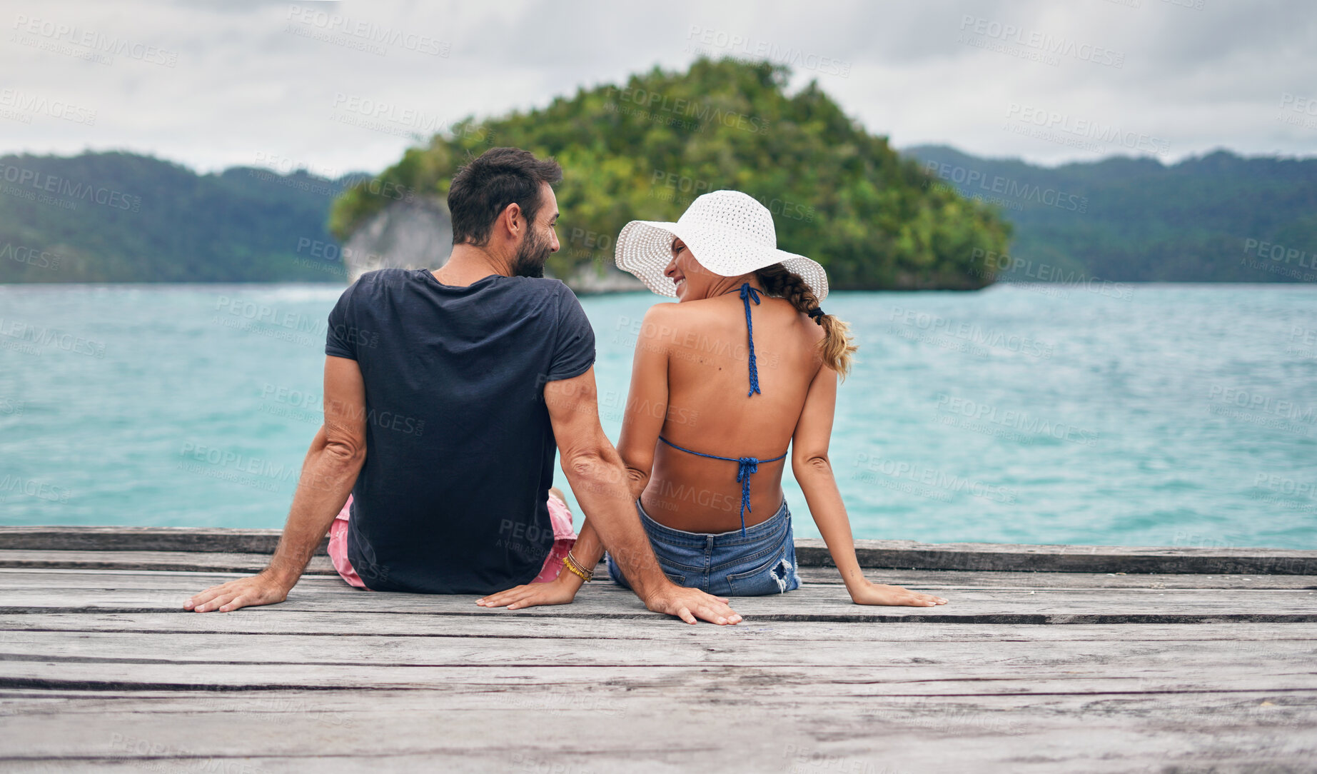 Buy stock photo Back, couple and vacation together on ocean deck, dock or sitting on boardwalk to relax or enjoy the sea or water landscape. People, man and woman on holiday, summer travel or date in tropical nature