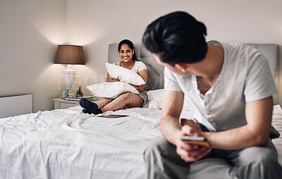 Buy stock photo Couple, woman and relax on bed with phone for cheating, infidelity or social media affair with ignorant wife. People, man or text message on smartphone at night for sneaky chat or unfaithful marriage