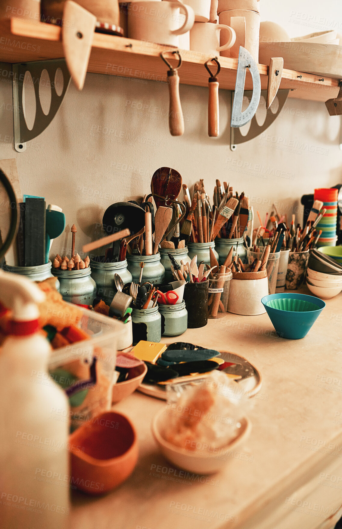 Buy stock photo Sculpting, wooden tools and pottery in workshop on shelf for manufacturing startup and ceramics production. Small business, display and sculpture equipment in creative studio with earthenware stock