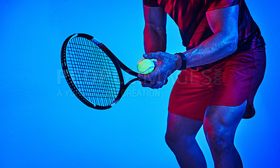 Buy stock photo Man, hands or tennis with ball for serve, game or match start in studio on a blue background. Closeup, male person or professional athlete with racket for swing, competition or sports tournament