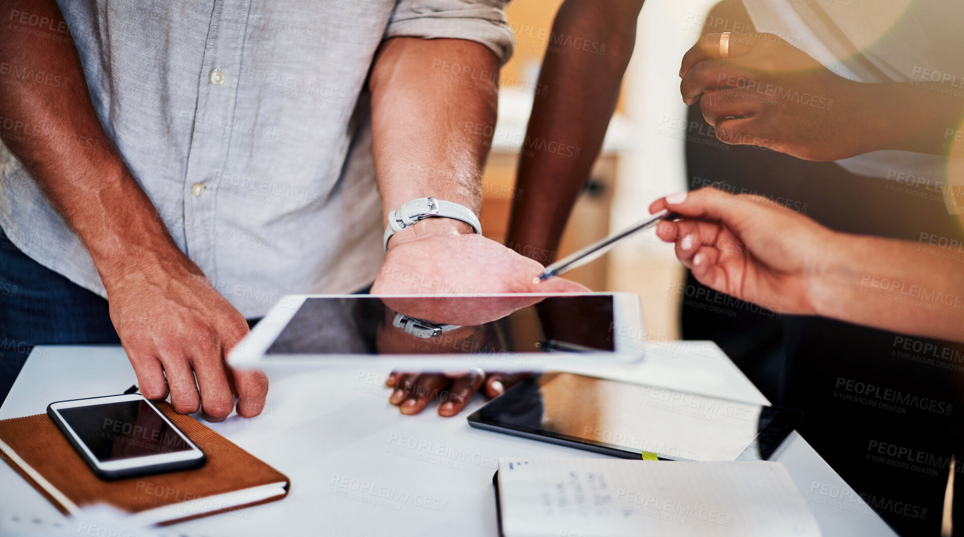 Buy stock photo Cropped shot of a group of creative business colleagues meeting in the boardroom